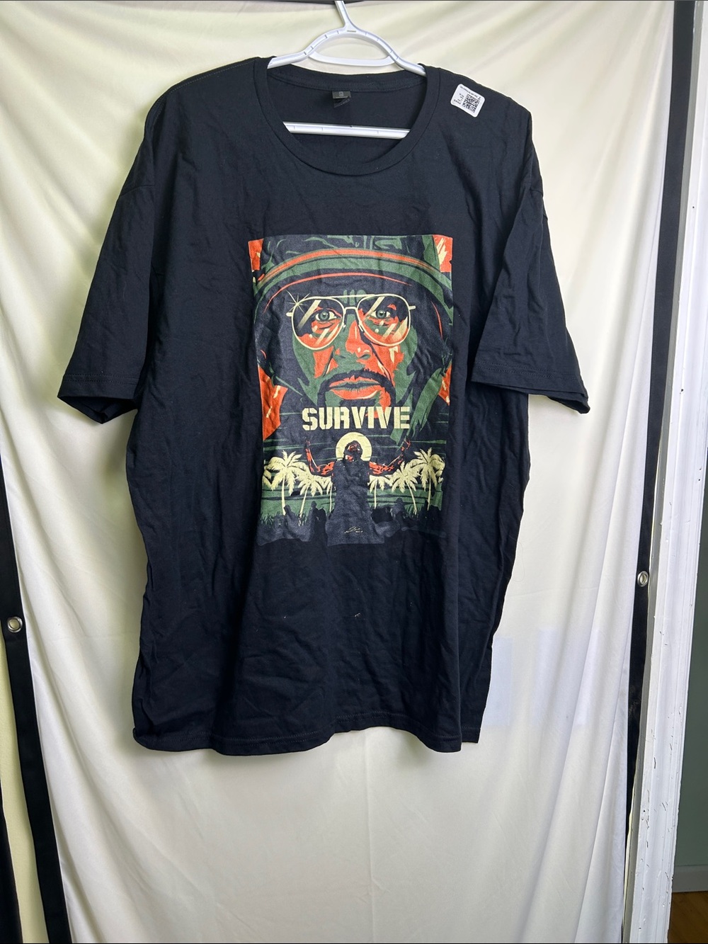'Survive' Graphic Tee from Tropic Thunder - Black
